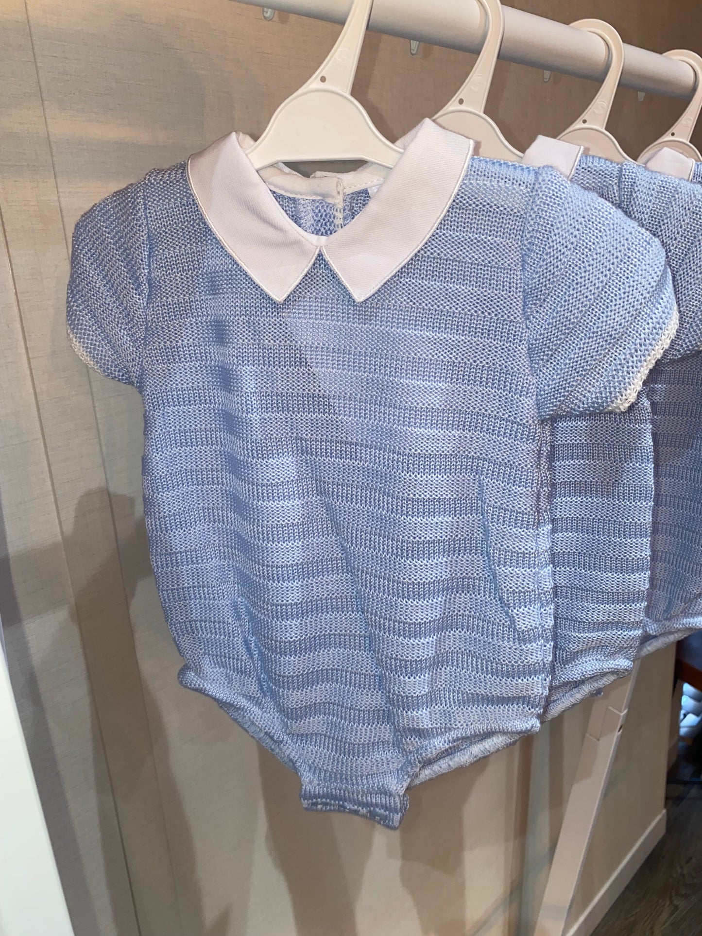 Sky blue knitted baby romper with white collar from Pex