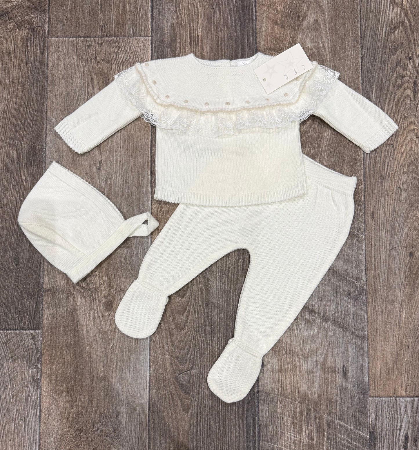 Cream knitted baby girl outfit with lace detail