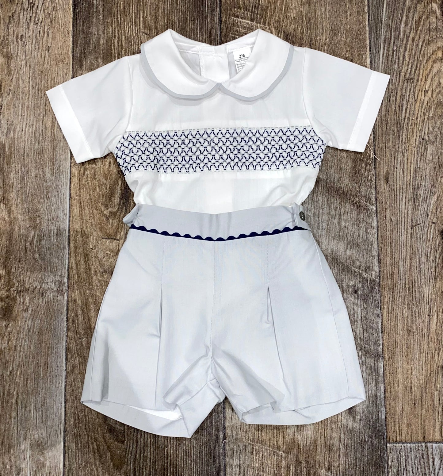 smocked baby occasion outfit with tailored shorts