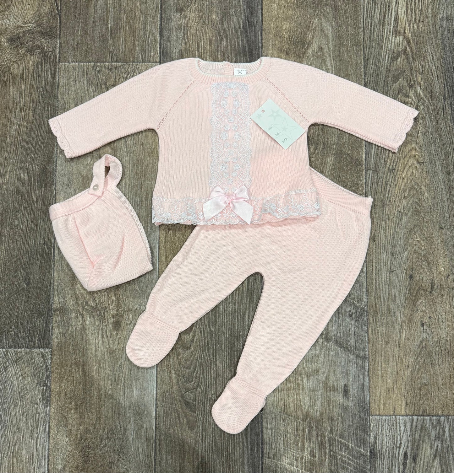 Blush pink knitted baby girl outfit with lace detail
