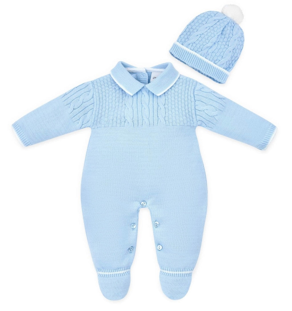 Blue knitted baby outfit with a matching hat on a white background