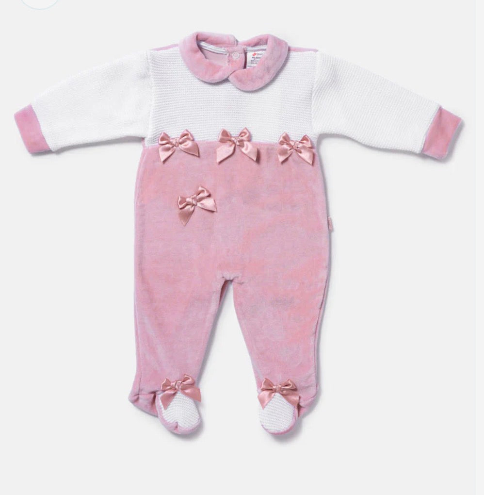 Pink velour baby sleepsuit with satin bows