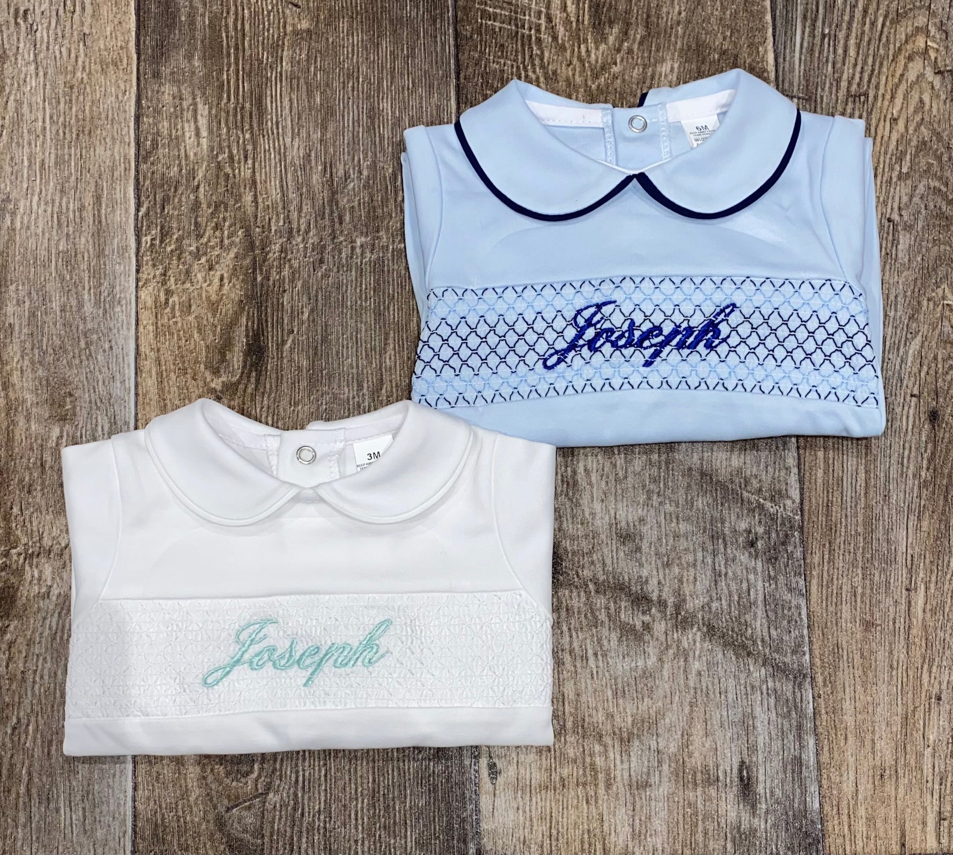 Traditional unisex Spanish baby sleepsuit with smocking detail