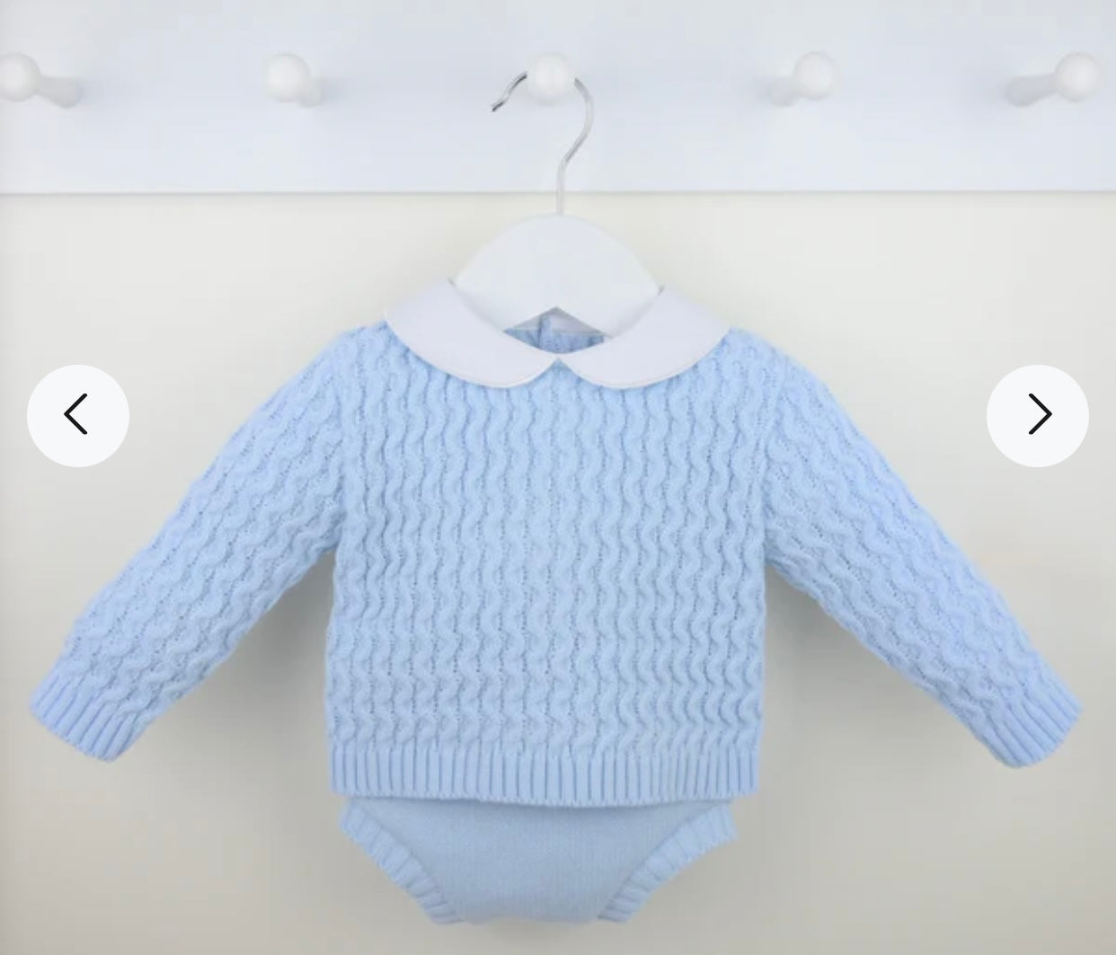 Light spanish baby boys blue knitted baby outfit with white collar