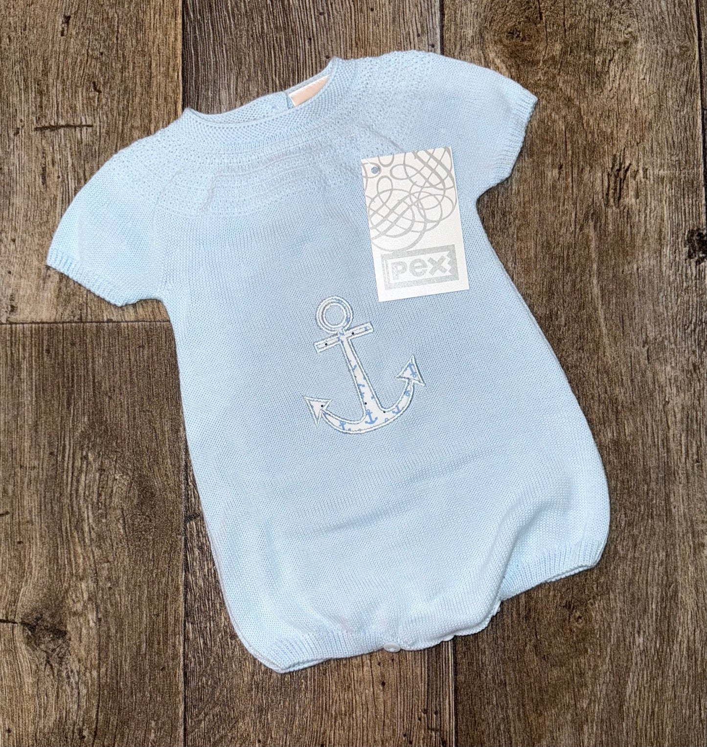 Powder blue knitted baby romper with anchor from Pex