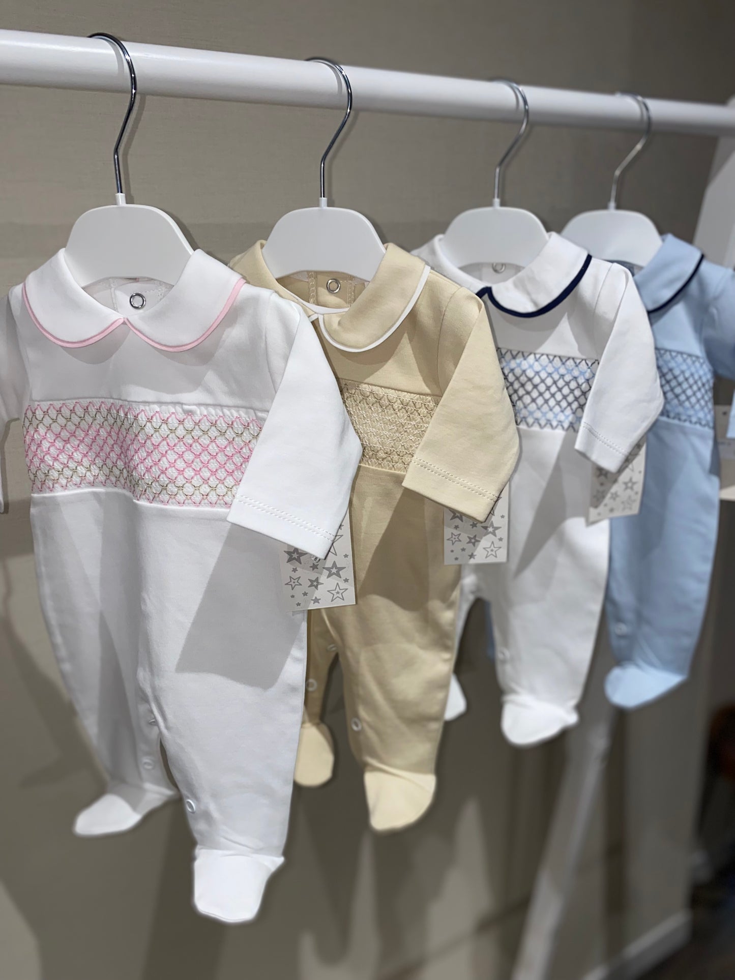 Traditional Spanish smocked baby sleepsuit with Peter Pan collar