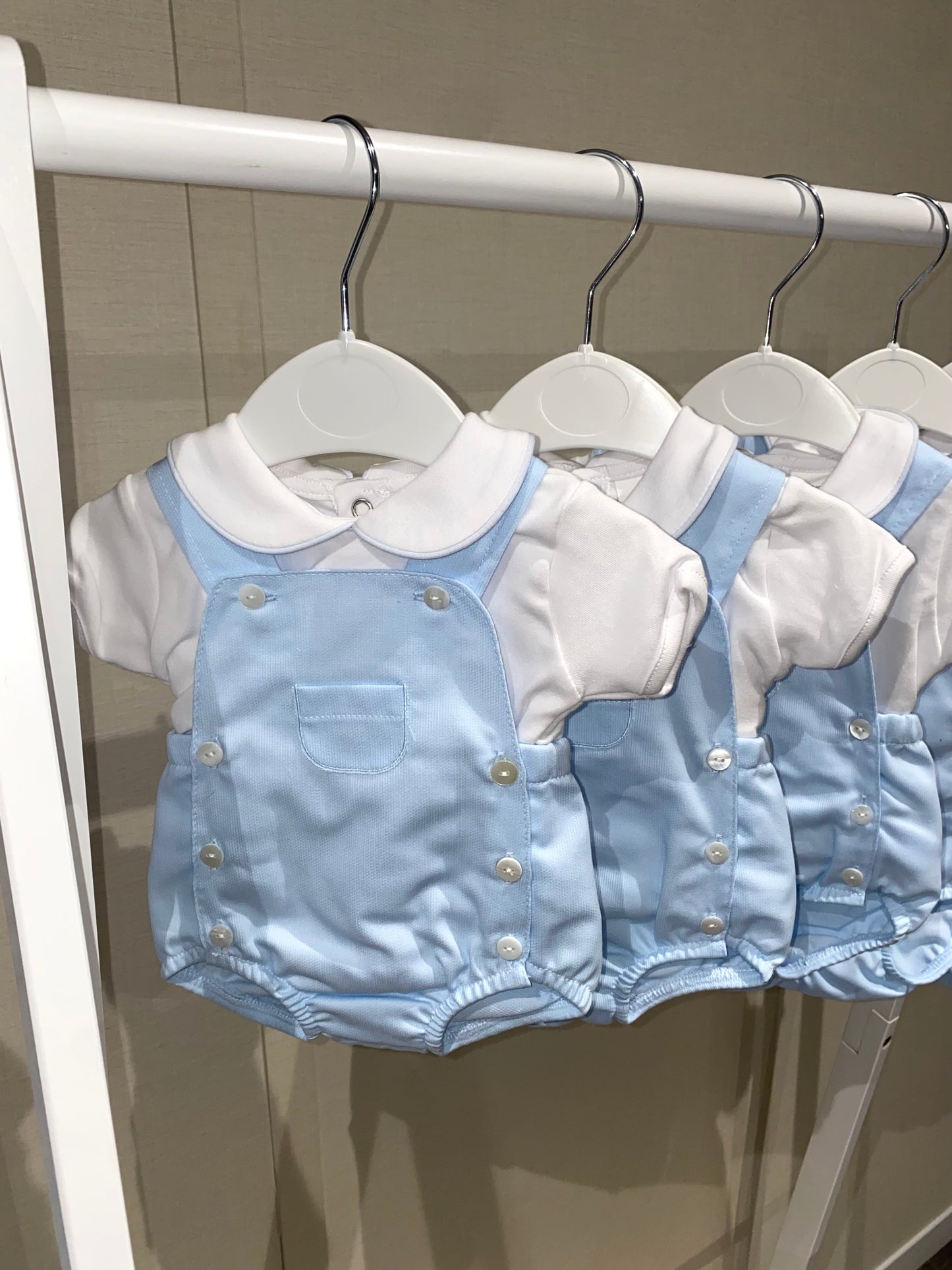 Blue baby dungaree romper set with white collar