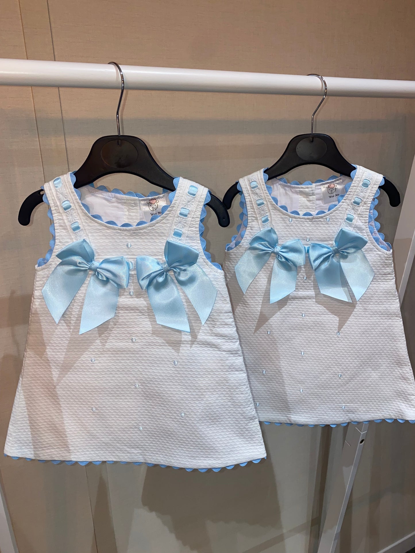 Wee Me White baby dress with sky blue satin bows