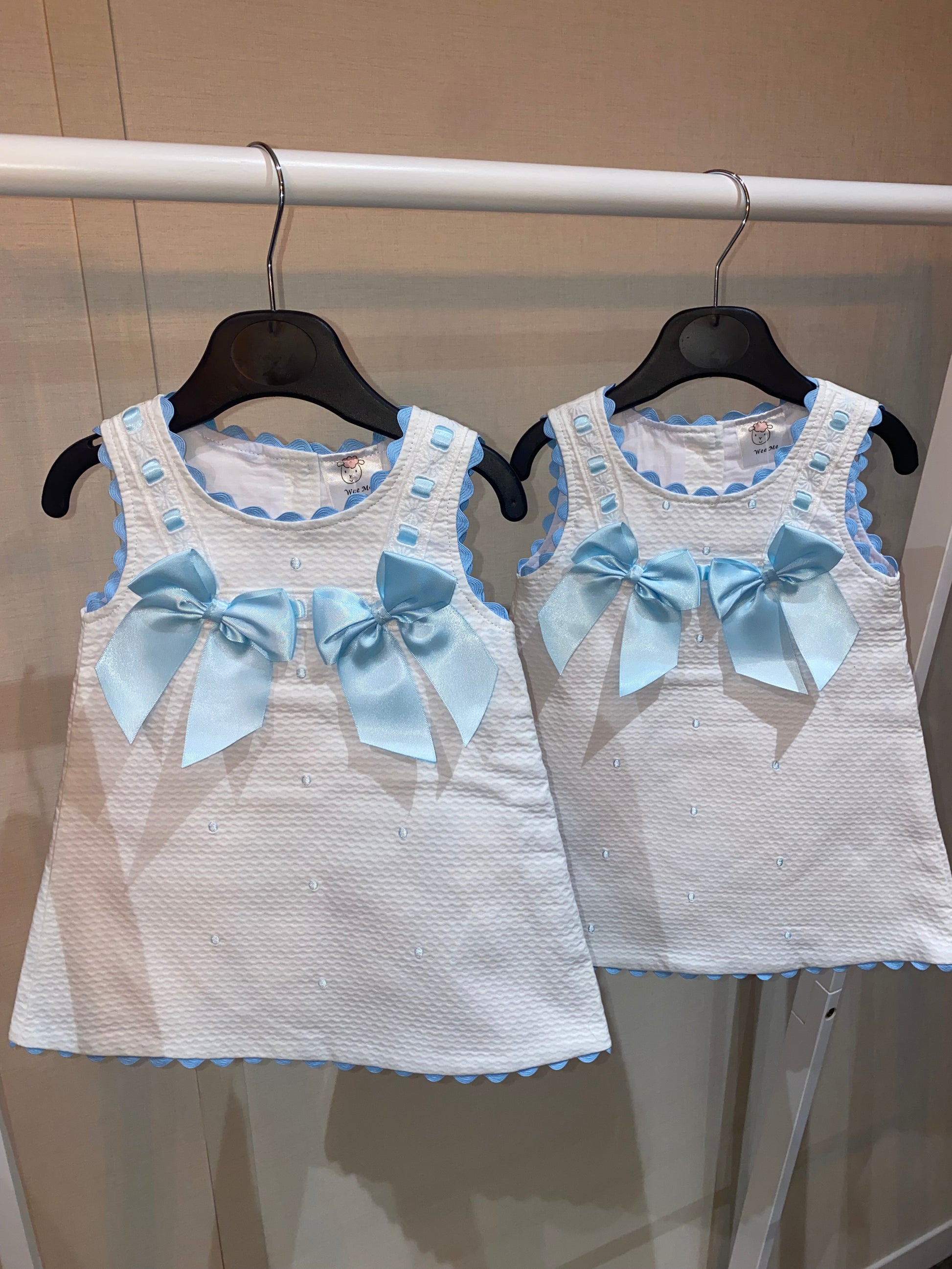 Wee Me White baby dress with sky blue satin bows