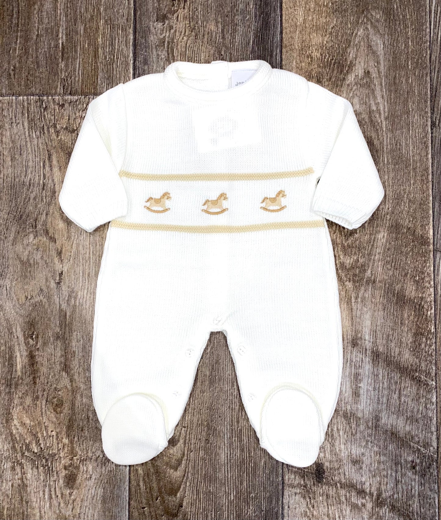 white Soft knit baby sleepsuit in neutral colours
