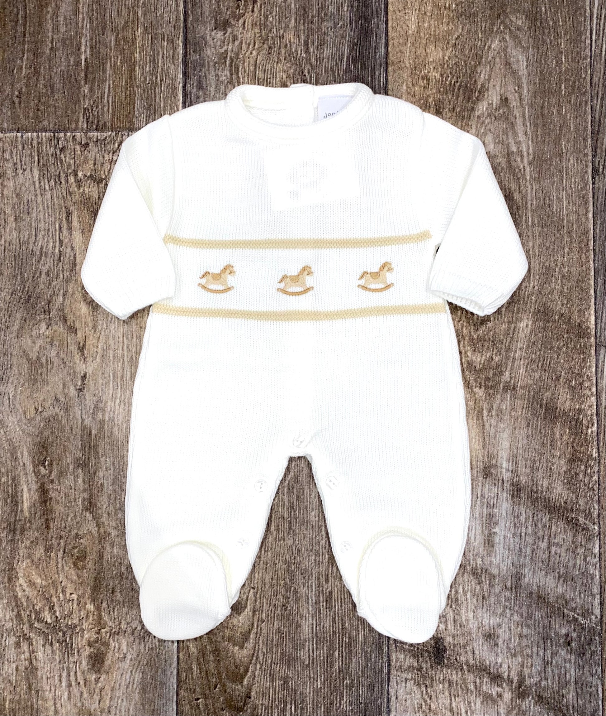 white Soft knit baby sleepsuit in neutral colours