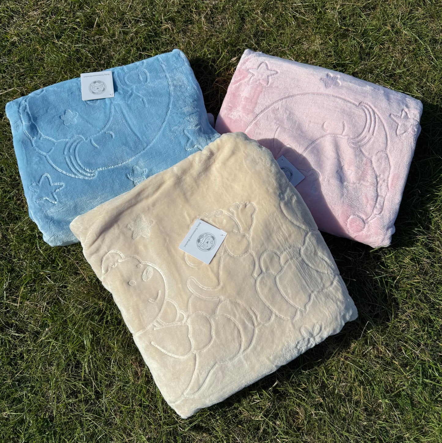 embossed baby blanket with moon and teddy bear design