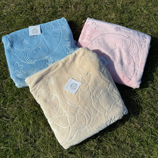 embossed baby blanket with moon and teddy bear design