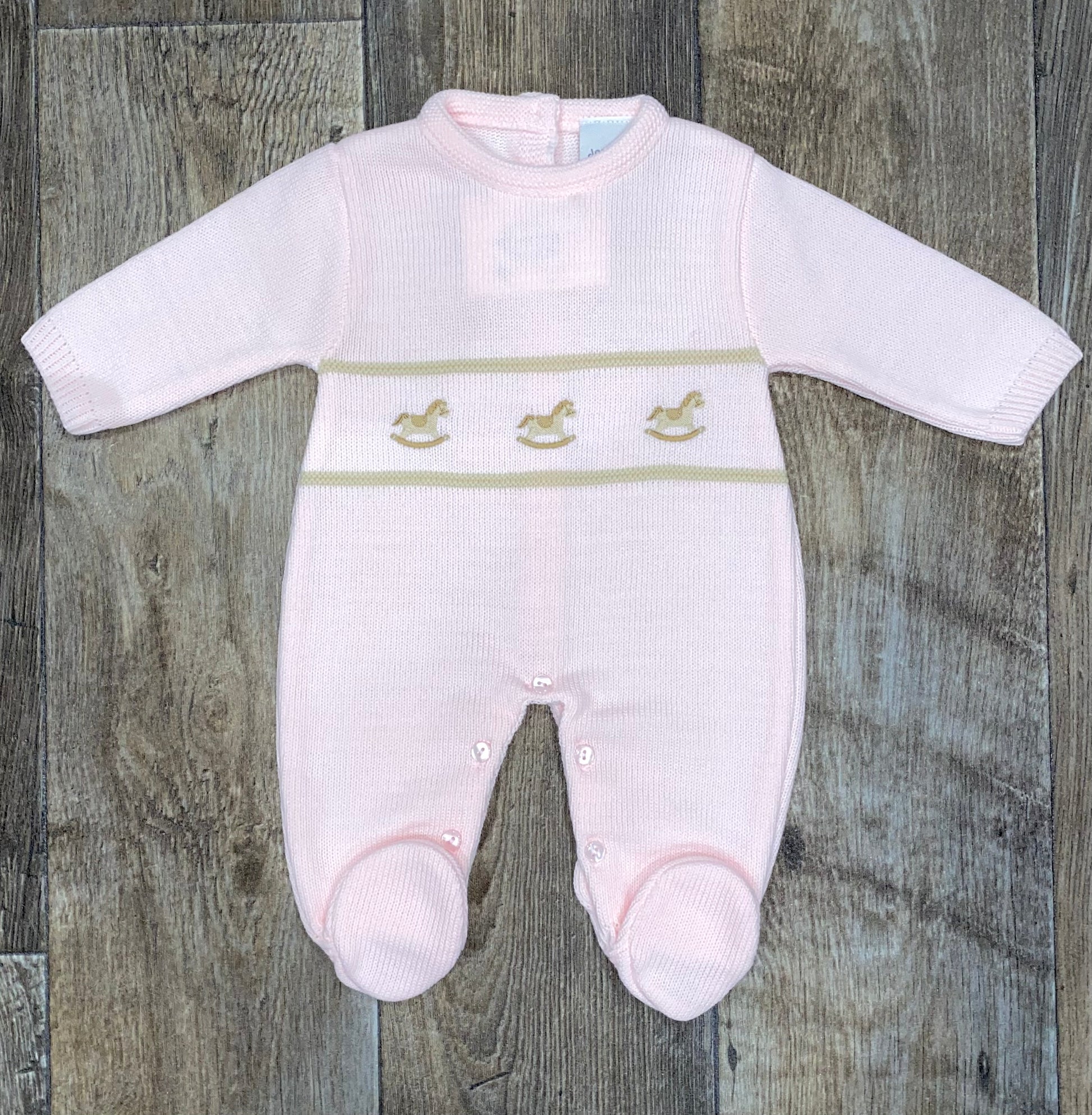 Classic Spanish style baby knit babygrow from dandelion