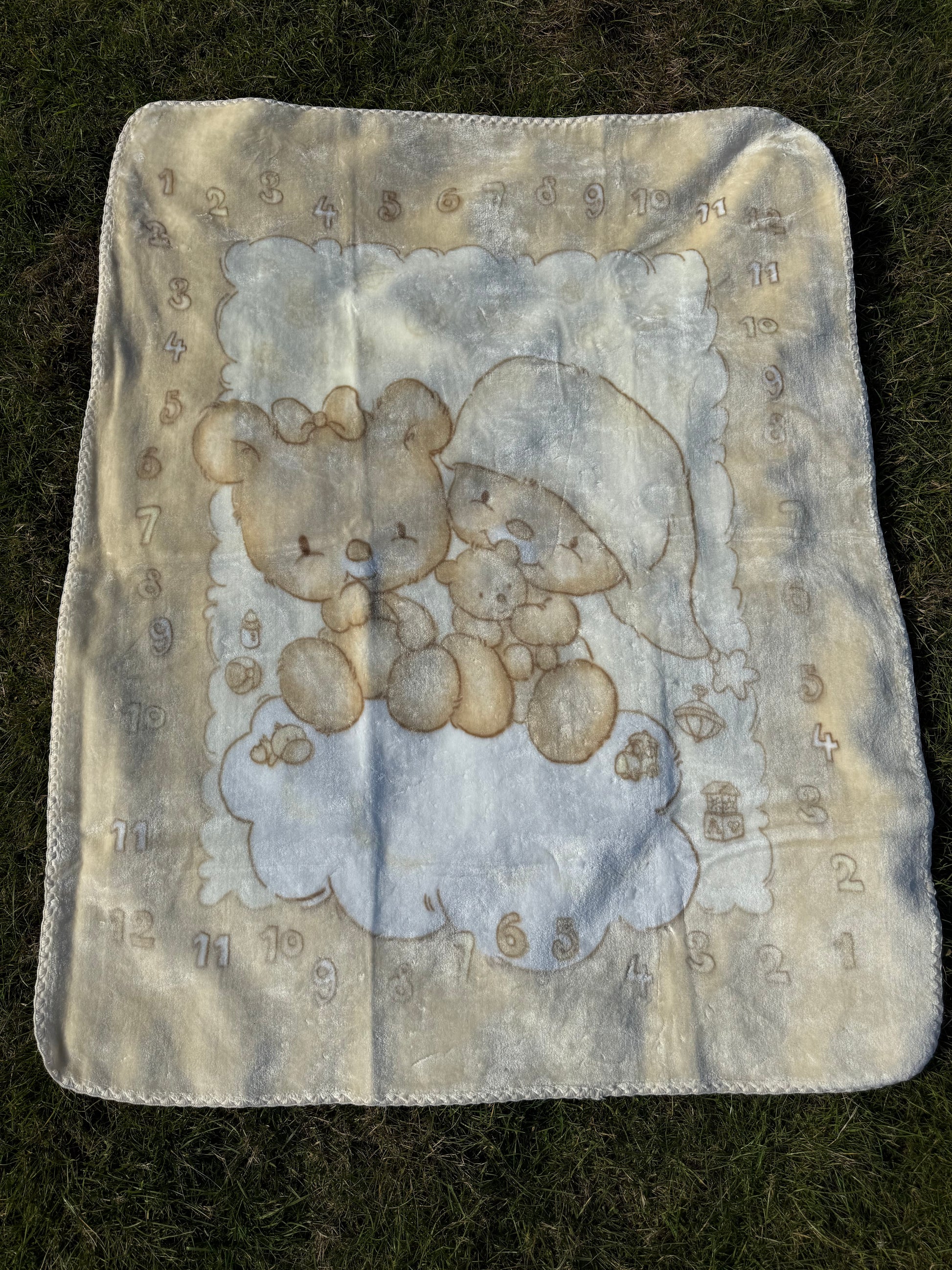 Soft baby milestone blanket set in cream with teddy bear design