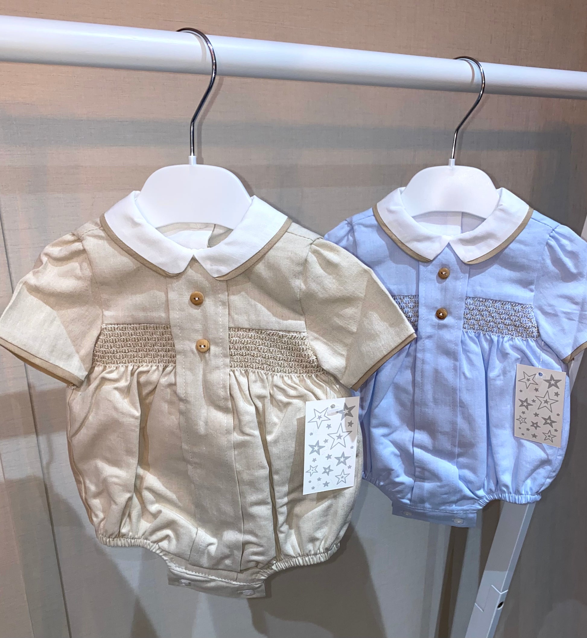 Traditional baby boy summer outfit with smocked detailing